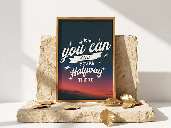 Affiche Essences Agape avec citation de motivation "you can and you're halfway there" sur fond de ciel étoilé et coucher de soleil.