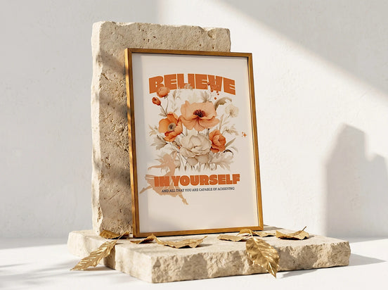 Affiche Essences Agape "Believe in Yourself" avec des fleurs d'orange et de crème, art mural motivant pour la confiance en soi.