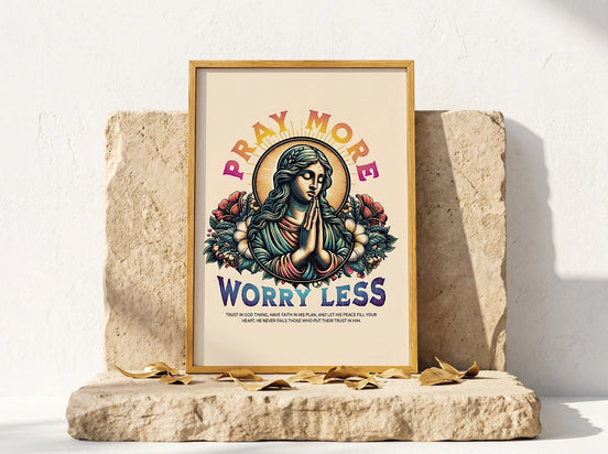 Essences Agape affiche religieuse avec une figure priant, entourée de fleurs, texte "Pray More Worry Less".